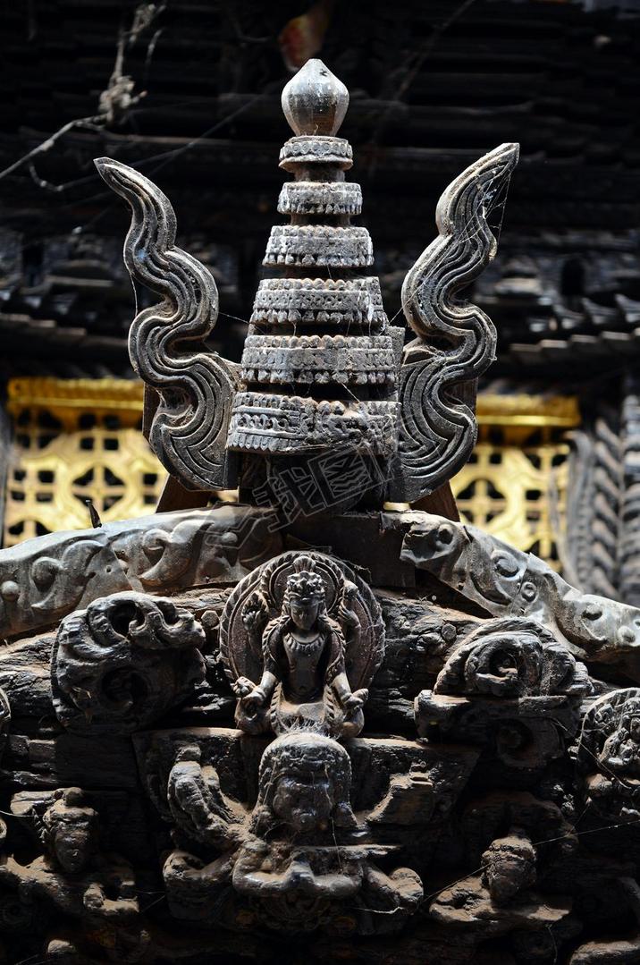 Carved wooden details on a Nepalese temple door