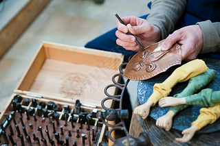 Sicilian puppet artisan at work