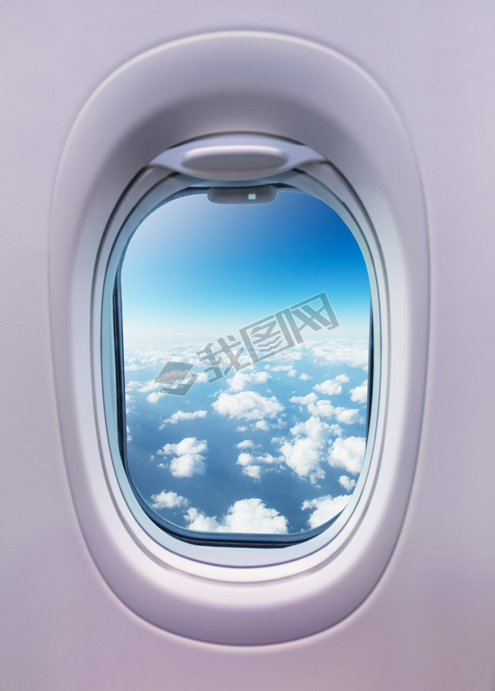 Airplane interior with window view of clouds. Concept of trel and air transportation