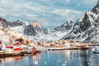 Beautiful fishing village in snow valley on winter