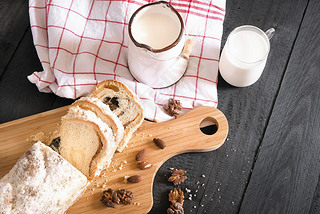 Tasty snack with milk and sponge cake