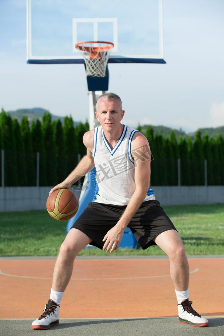 Portrait of young man street basket player