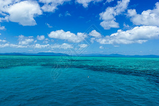 beautiful great barrier reef with white clouds on a sunny day, cairns, australia