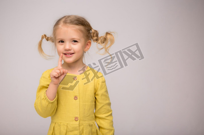 cute little girl in yellow dress