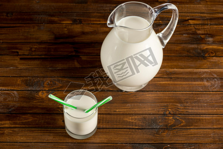 Fresh milk in glass and jug 