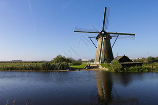 Old windmill with house