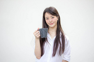 portrait of thai china adult office girl white shirt drinking coffee