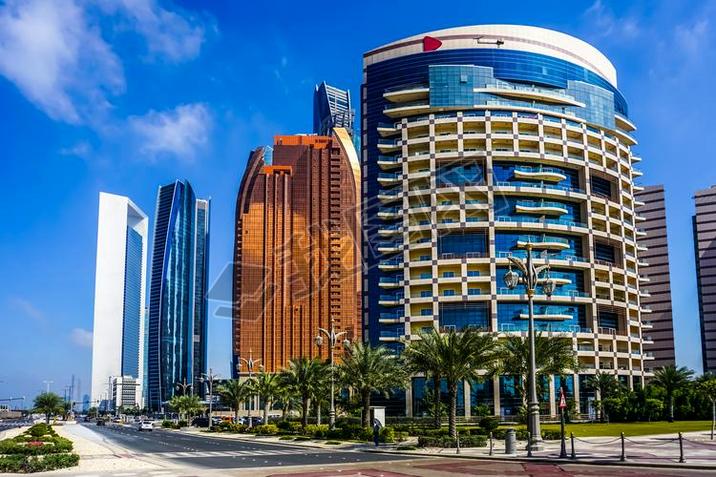 Abu Dhabi Picturesque Breathtaking Highrises with Blue Windows and Palm Trees