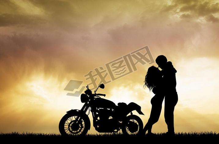 couple kissing on motorcycle