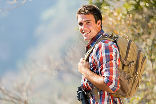 young man in autumn mountain