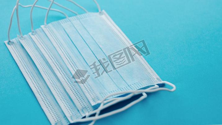 Medical mask, Medical protective masks on blue background. Disposable surgical face mask cover the m