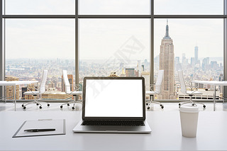 Front view of the workplace in a modern panoramic office in New York. White tables and white chairs.