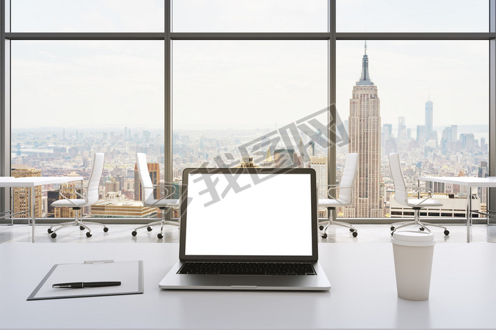 Front view of the workplace in a modern panoramic office in New York. White tables and white chairs.