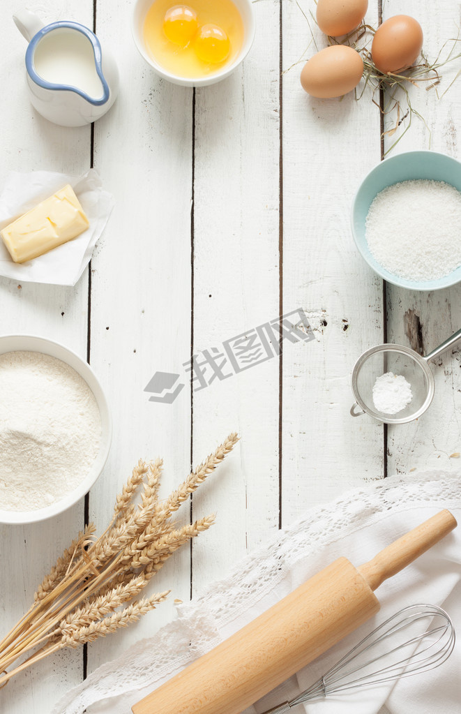 Rustic kitchen - dough recipe ingredients on white wood