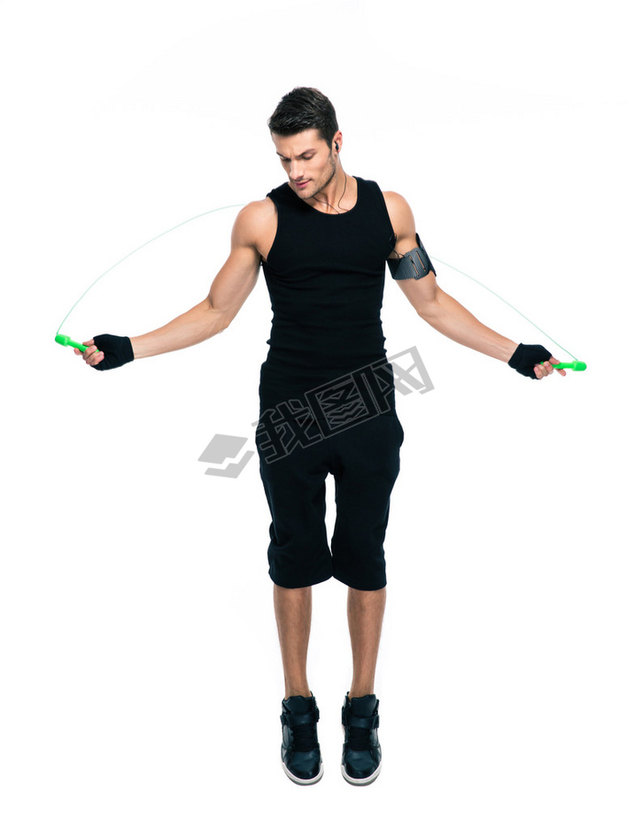 Fitness man jumping with skipping rope
