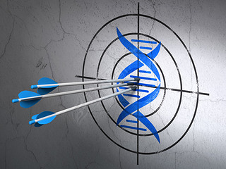 Healthcare concept: arrows in DNA target on wall background