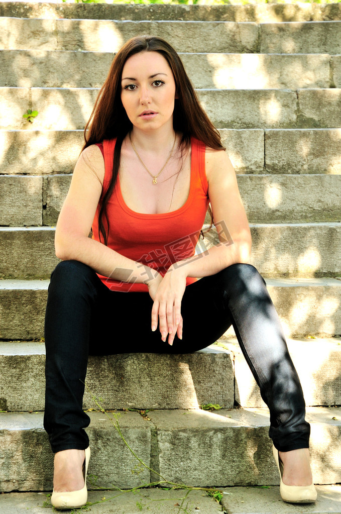 Brunette girl on the stairs