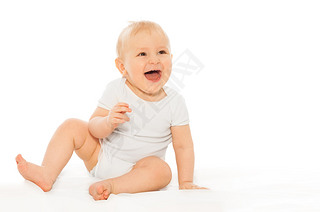 happy laughing baby in white bodysuit