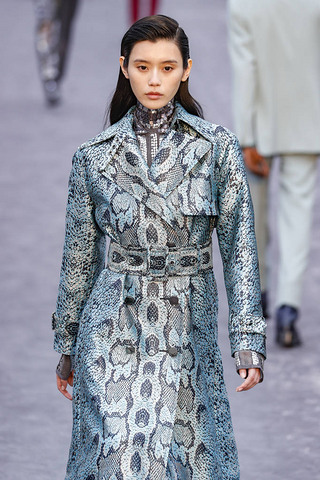 MILAN, ITALY - FEBRUARY 23: A model walks the runway at the Roberto Calli show at Milan Fashion We