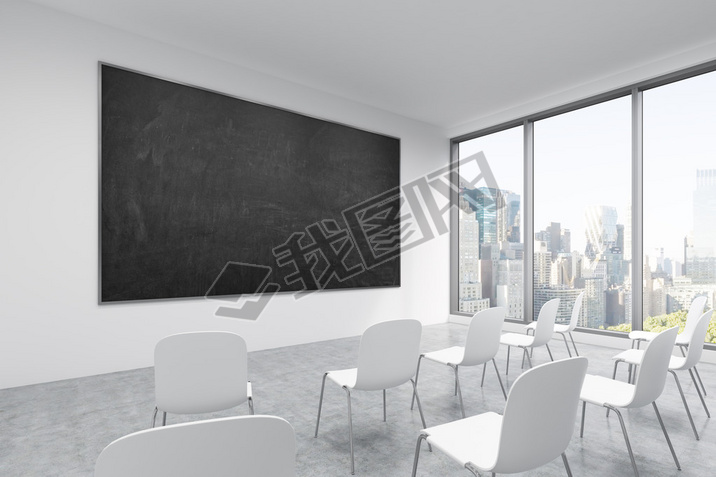 A classroom or presentation room in a modern university or fancy office. White chairs, a black chalk