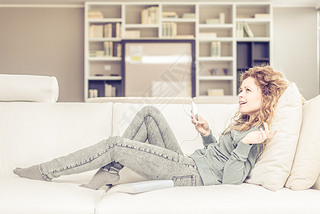 Woman listens music at home