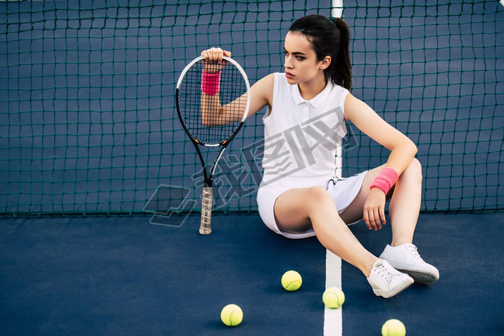 Girl on tennis court