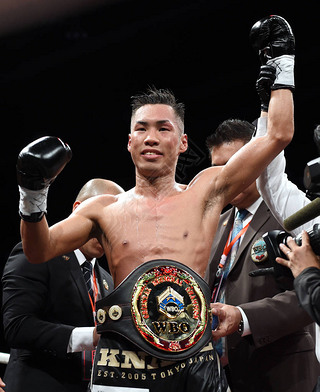 Takuya Watanabe of Japan celebrates after winning the WBO super featherweight  intercontinental titl