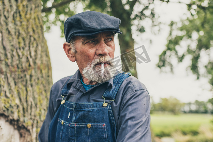 Senior country farmer oking