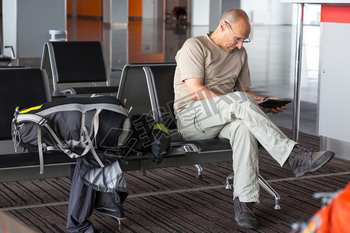 Aged passenger waiting for boarding