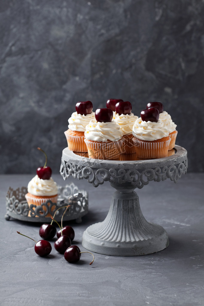 Cherry cupcakes on  cake stand