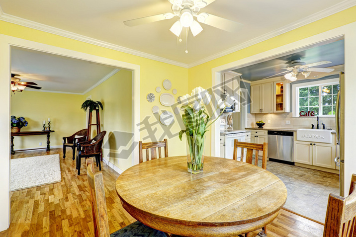 Bright yellow dining room