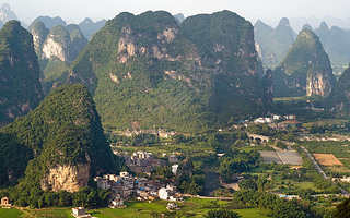 Guilin village at sunset from Moon Hill mountain. Yangshuo, China, Asia