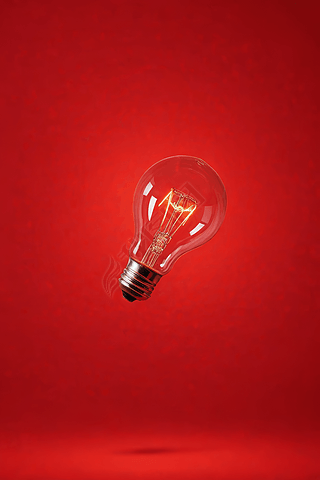 红色背景灯泡图片