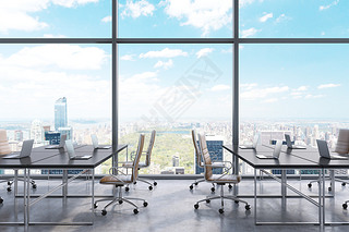 Workplaces in a modern panoramic office, New York city view from the windows. Open space. Black tabl