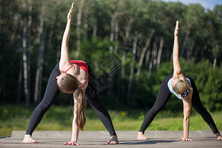 Yoga class: trikonasana pose