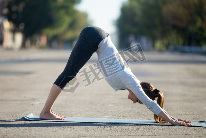 Street yoga: Downward facing dog pose