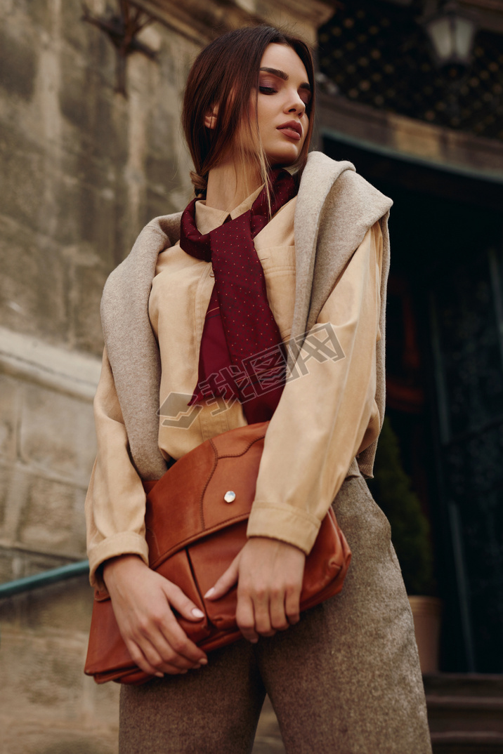 Woman In Fashionable Clothes In Street