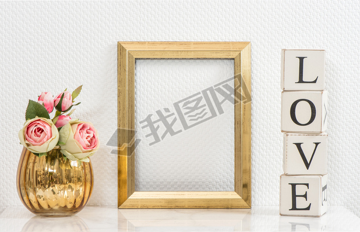 Mock up with golden frame and flowers. Love concept