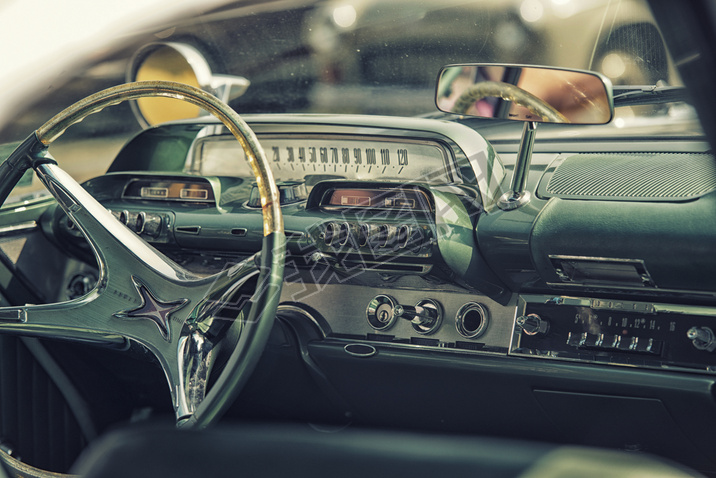 Sleza, Poland, August 15, 2015: Close up on old vintage car steering wheel and cockpit on  Motorclas