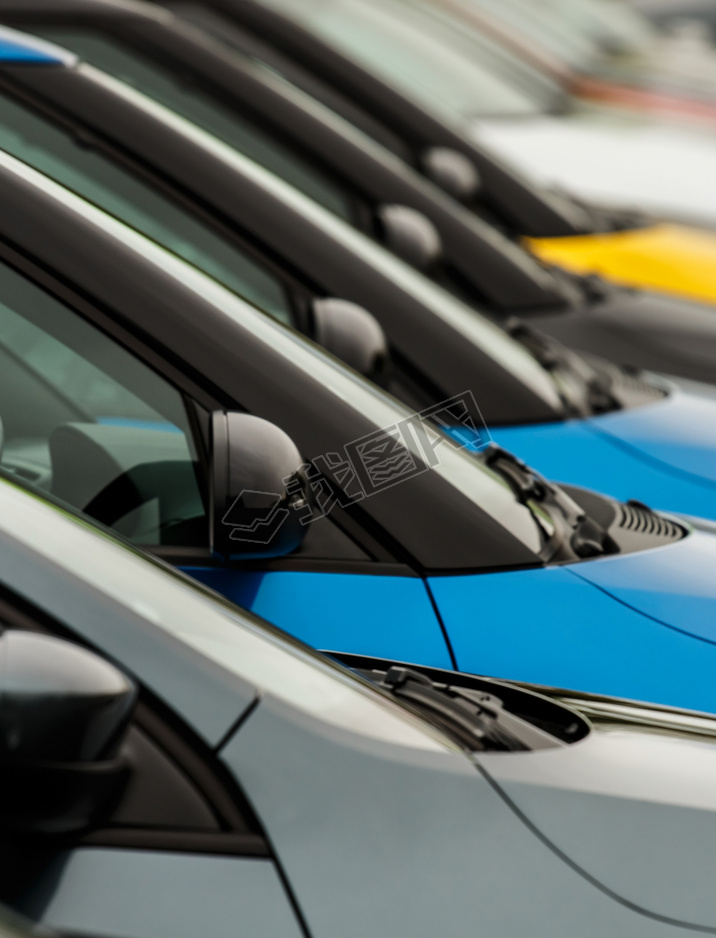 Car wingmirrors on display on dealers forecourt