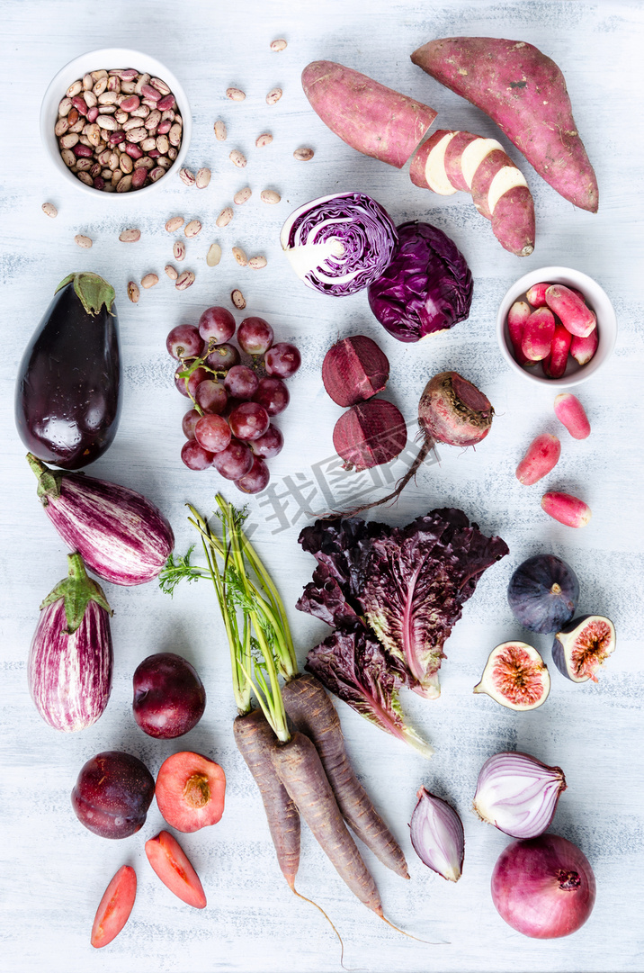 Assorted purple toned fruits and vegetables