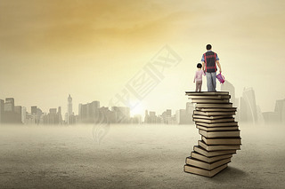 Child and her dad standing on a pile of books