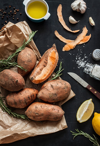 Preparing rosemary roasted sweet potatoes