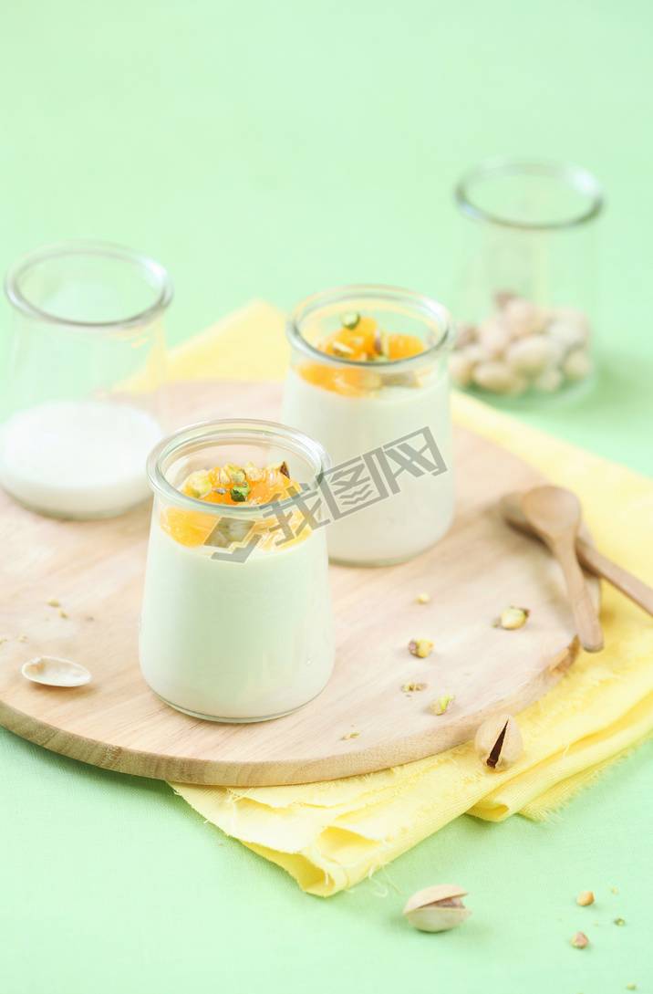 Pistachio Panna Cotta with Honey Orange Sauce