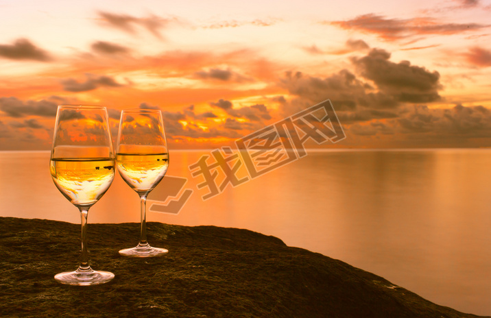 Wineglasses with ocean background