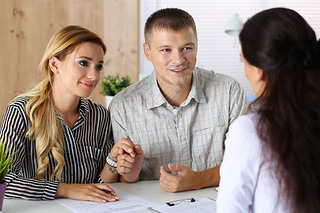 Young family couple trying to get loan