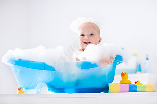 Little baby taking a bath