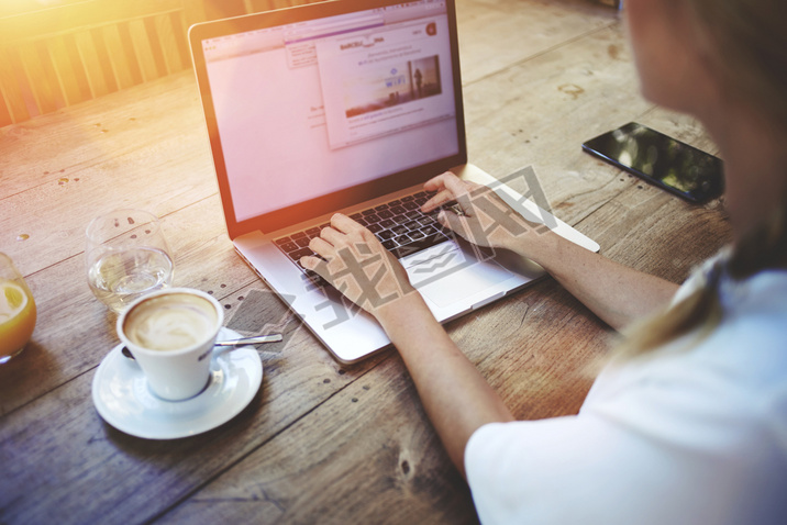 Young woman working on net-book