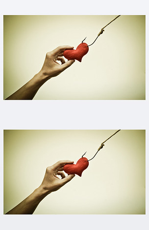 手抓一颗红色的心