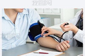 Female medicine doctor hands measuring blood pressure